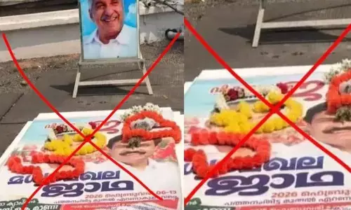 ഉമ്മന്‍ചാണ്ടിയുടെ കല്ലറയെയും വിടാതെ എല്‍.ഡി.എഫ്; ജാഥാ പോസ്റ്റര്‍ പതിപ്പിച്ച് അനാദരവ്; പുതുപ്പള്ളിയില്‍ പ്രതിഷേധമിരമ്പുന്നു