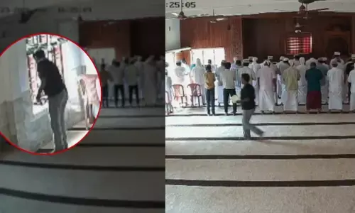 മുന്നിൽ എല്ലാവരും കണ്ണടച്ച് പ്രാർത്ഥനയോടെ നിന്ന് നമസ്ക്കരിക്കുന്ന കാഴ്ച; ഇതിനിടെ ആരും കാണില്ലെന്ന് വിചാരിച്ച് ഒരു വിരുതന്റെ അതിരുവിട്ട പ്രവർത്തി; ക്യാമറ കണ്ണുകൾ കൈയ്യോടെ പൊക്കി