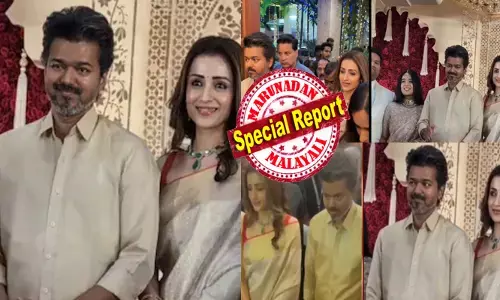 ഒരുകാറിൽ ഒരേപോലത്തെ നിറമുള്ള ഡ്രെസ്സിൽ തിളങ്ങി ദേ..അവർ; ആരെയും കൂസാതെ കൈയ്യിൽ ബൊക്കയുമായി എല്ലാവരോടും ചിരിച്ച് കൊണ്ട് വിശേഷങ്ങൾ പങ്കുവെച്ച് നടത്തം; തലയ്ക്ക് മുകളിൽ വിവാദങ്ങൾ ചുറ്റിക്കറങ്ങുന്നതിനിടെ കല്യാണവേദിയിൽ ഒന്നിച്ചെത്തി വിജയ് യും തൃഷയും; ഇളകിമറിഞ്ഞ് സോഷ്യൽമീഡിയ