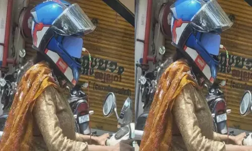 ചിലപ്പോൾ സ്വന്തം തലച്ചോർ തന്നെ ആ സമയത്ത് നേരെ പ്രവർത്തിക്കില്ല; ചാർജ്ജ് ചെയ്യുന്ന ഫോൺ ഹെൽമെറ്റിൽ വച്ച് സംസാരം; ഓടുന്ന വണ്ടിയിൽ അതിസാഹസം വേണ്ടെന്ന് എംവിഡി