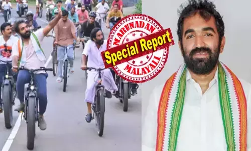 പെട്രോൾ കിട്ടാനില്ല; അതുകൊണ്ട് ഇനി സൈക്കിൾ ചവിട്ട് തന്നെ ശരണം! റോഡിൽ ഒരു ഗിയർ സൈക്കിളുമായി നേതാവ്; കൂടെ കട്ടയ്ക്ക് നിൽക്കുന്ന അണികളും; തെരഞ്ഞെടുപ്പ് പ്രചാരണ ശൈലി മാറ്റി പുതുപ്പള്ളിയുടെ സ്വന്തം ചാണ്ടി ഉമ്മൻ; ജനനായകന്റെ വരവ് കണ്ട് ആവേശത്തിലായി വോട്ടർമാർ