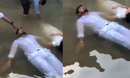 അയ്യോ..ഇവർക്ക് ജീവനുണ്ടോ? ഒരു തടാകത്തിൽ പൊന്തികിടക്കുന്ന നവദമ്പതികൾ; കണ്ണുകൾ അടച്ച് അനങ്ങാതെ കിടപ്പ്; പ്രീ വെഡ്ഡിംഗ് ഫോട്ടോഷൂട്ടിന് വ്യാപക വിമർശനം