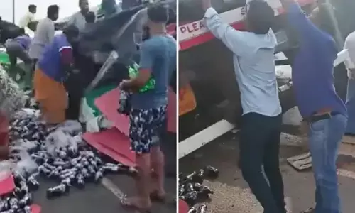 ദാരിദ്ര്യമല്ല, ഇത് പച്ചയായ ക്രൂരത! മറിഞ്ഞ ലോറിയില്‍ നിന്ന് മദ്യ കുപ്പികള്‍ വാരിക്കൂട്ടാന്‍ ഓടിയെത്തി നാട്ടുകാര്‍; പരിക്കേറ്റ ഡ്രൈവറുടെ നിലവിളി അവഗണിച്ച്  ശീതളപാനീയ കുപ്പികള്‍ കടത്തി;  വൈറല്‍ ദൃശ്യങ്ങള്‍