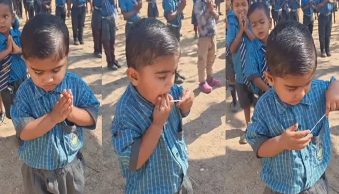 യൂണിഫോം ധരിച്ച് വരിയായി പ്രാർത്ഥനയോടെ നിൽക്കുന്ന കുരുന്നുകൾ; അതിനിടയിൽ കണ്ണടച്ച് നിന്ന ചെറുക്കന്റെ കുസൃതി; ചിരി പടർത്തി ചിത്രങ്ങൾ യൂണിഫോം ധരിച്ച് വരിയായി പ്രാർത്ഥനയോടെ നിൽക്കുന്ന കുരുന്നുകൾ; അതിനിടയിൽ കണ്ണടച്ച് നിന്ന ചെറുക്കന്റെ കുസൃതി; ചിരി പടർത്തി ചിത്രങ്ങൾ