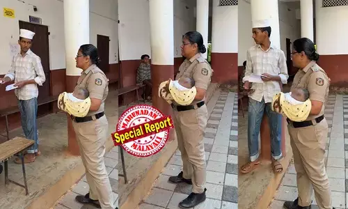 ആ യൂണിഫോമിനുള്ളിലും തുടിക്കുന്ന മാതൃഹൃദയം! കത്തുന്ന ചൂടില്‍ വോട്ട് ചെയ്യാനെത്തിയ അമ്മയ്ക്ക് തണലായി  പോലീസ് ഉദ്യോഗസ്ഥ; കൈക്കുഞ്ഞിനെ നെഞ്ചോട് ചേര്‍ത്ത് കാവലായ മനോഹര ദൃശ്യം; നാദാപുരം നരിപ്പറ്റയിലെ പോളിംഗ് ബൂത്തില്‍ കണ്ടത് നന്മയുടെ വോട്ട്!