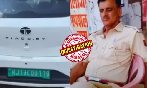 വിന്‍ഡ് ഷീല്‍ഡില്‍ ഷെയ്ഡിനായി നല്‍കിയ കളറിന്റെ പേരില്‍ പിടികൂടി;  ഇവി കാറിന് പുക പരിശോധിച്ച സര്‍ട്ടിഫിക്കറ്റില്ലെന്ന് പൊലീസ്; 1500 രൂപ പിഴയിട്ടു; വീഡിയോ പ്രചരിച്ചതോടെ സിസ്റ്റത്തിലെ പിഴവെന്ന് വിശദീകരണം